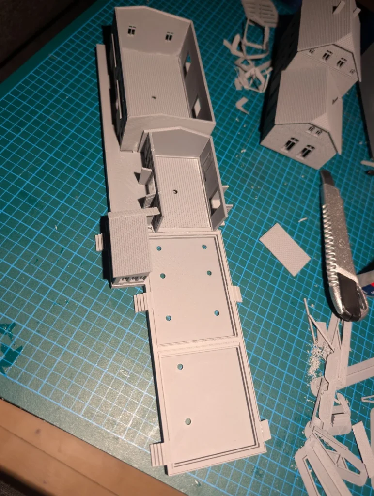 Photograph of the earlier N-scale test build with removable sections open to show the interior.